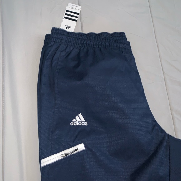 WOMENS ADIDAS CLIMAPROOF®️ Wind PANTS NAVY BLUE - Picture 5 of 8
